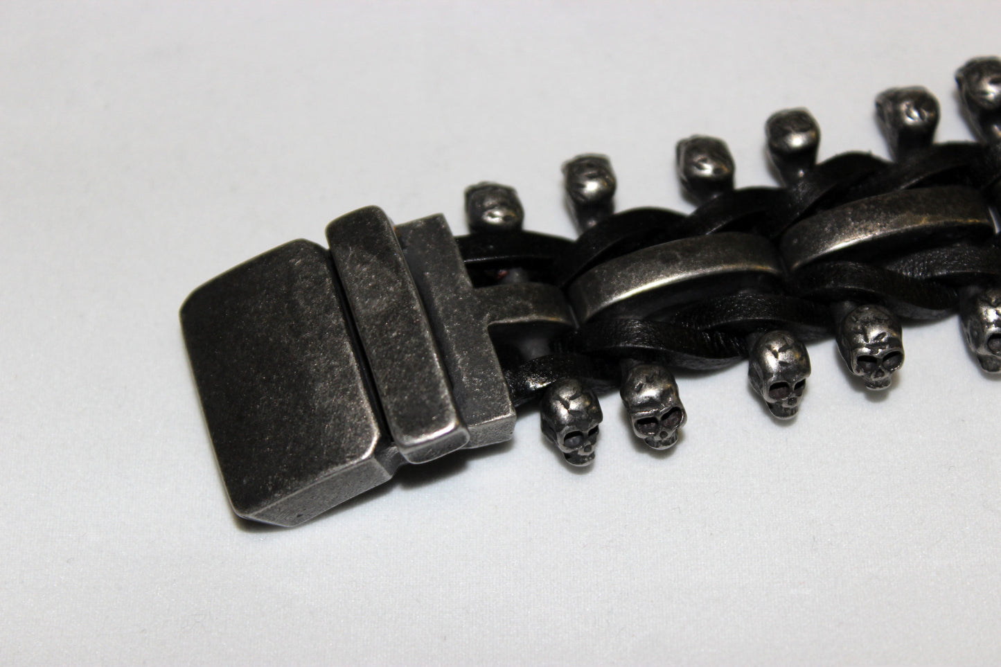 Stainless Steel Skull Links on Outside Weaved Leather Bracelet - UDINC0456