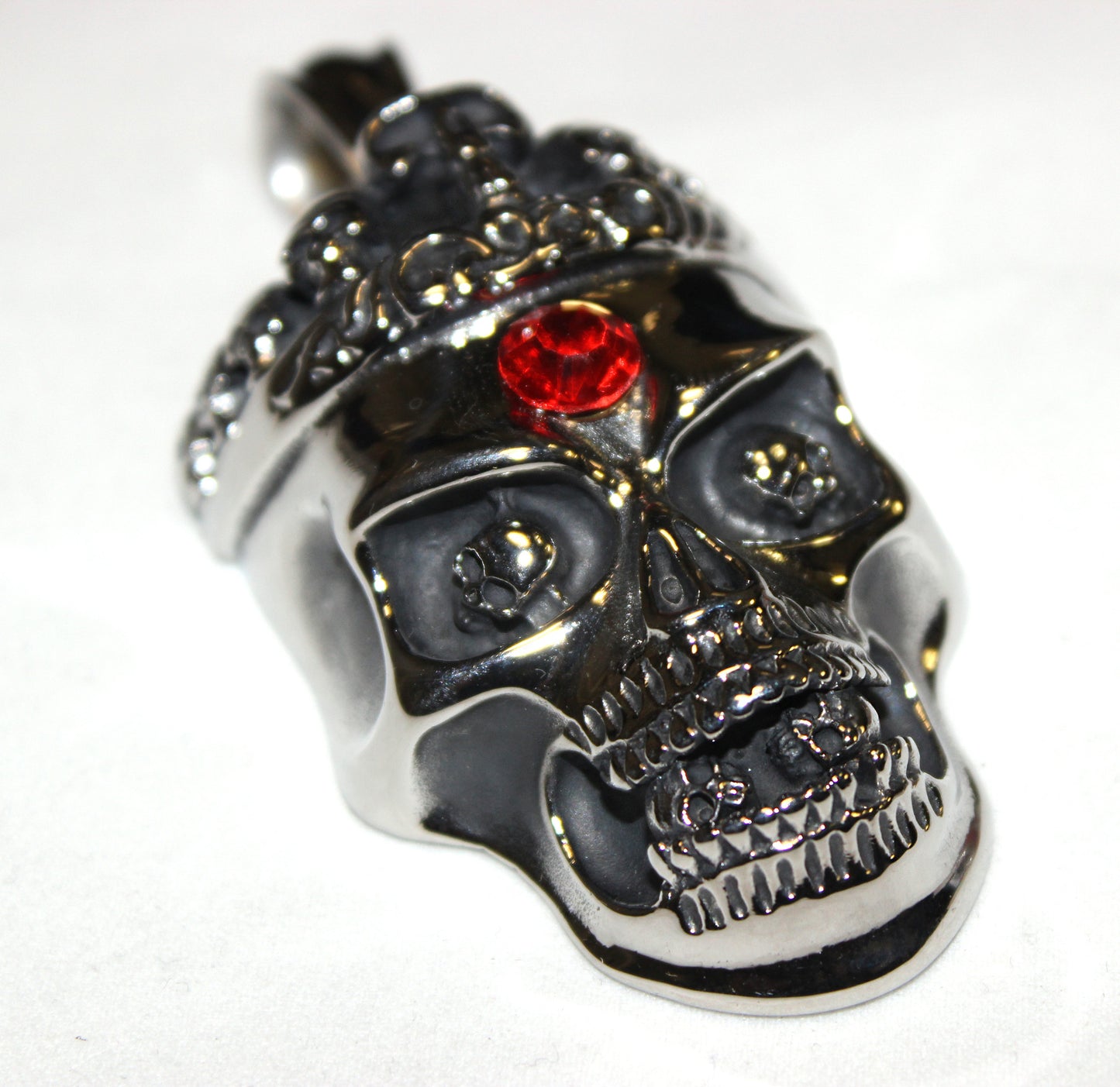 Stainless Steel Large Skull Crown with Red Stone Pendant- UDINC0472