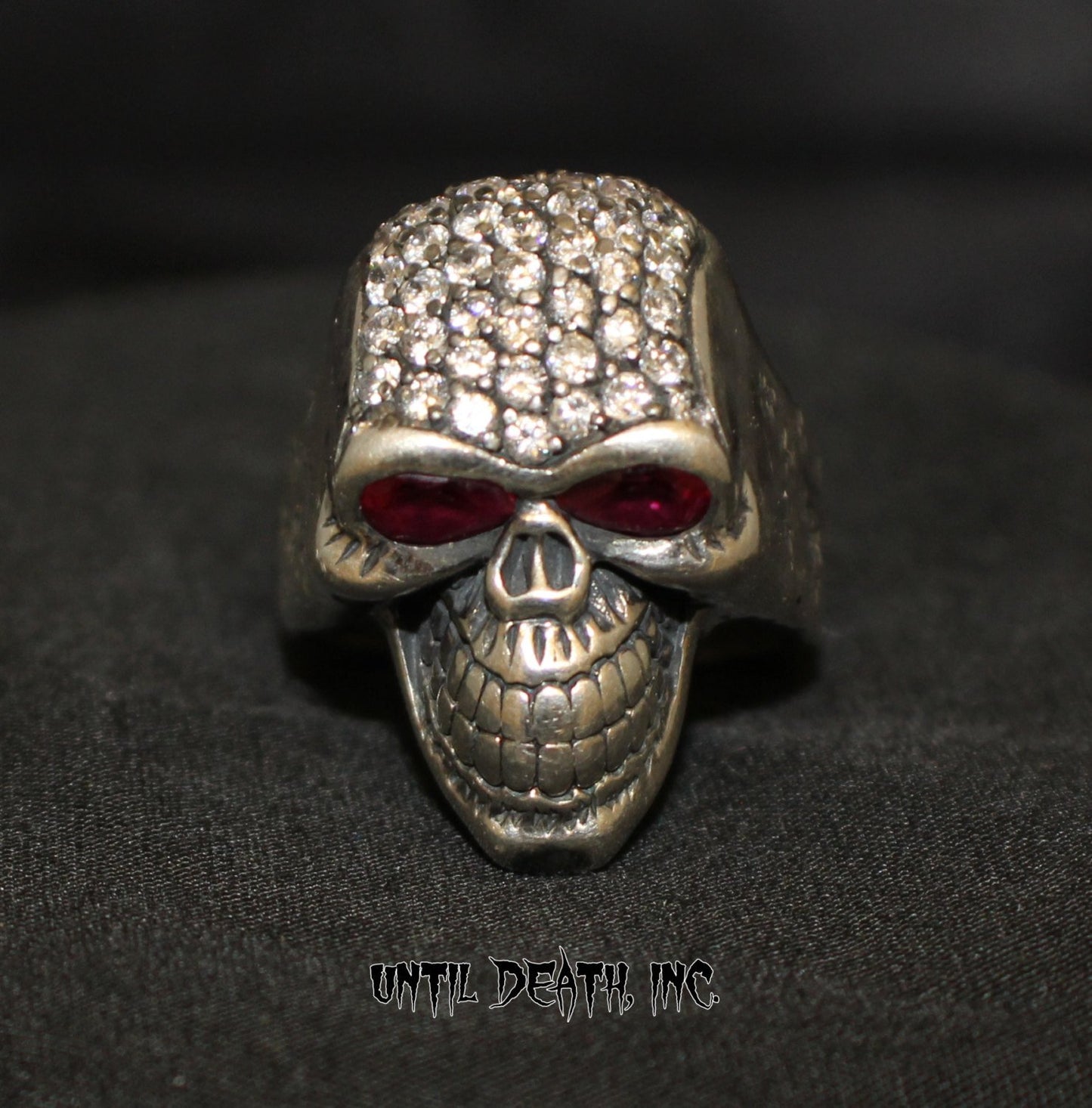 Custom Diamond Pave Smiling Skull Ring With Ruby Eyes in STERLING SILVER UDINC0073